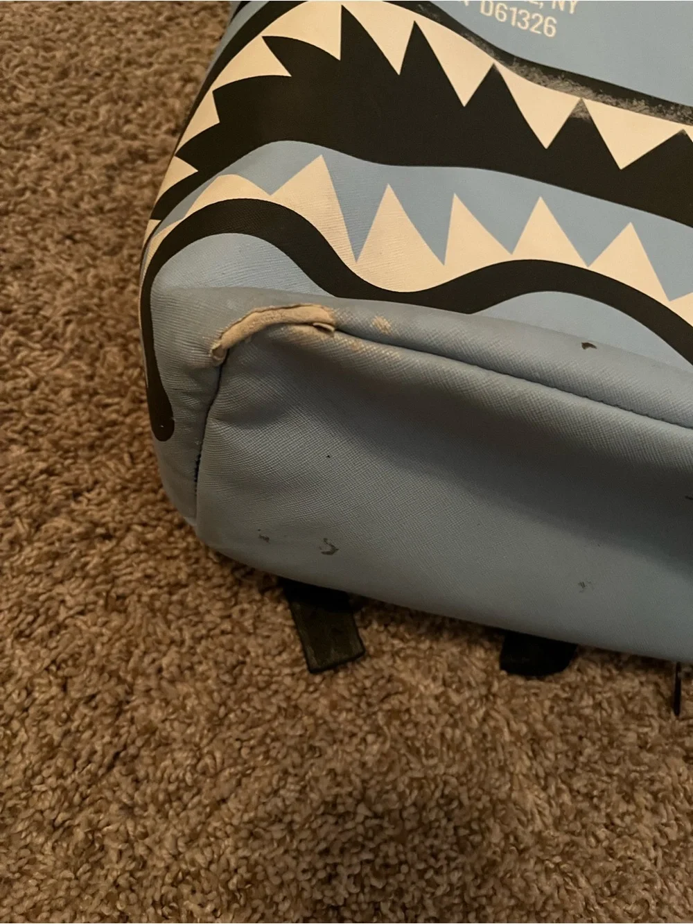 Sprayground Light Blue Backpack.